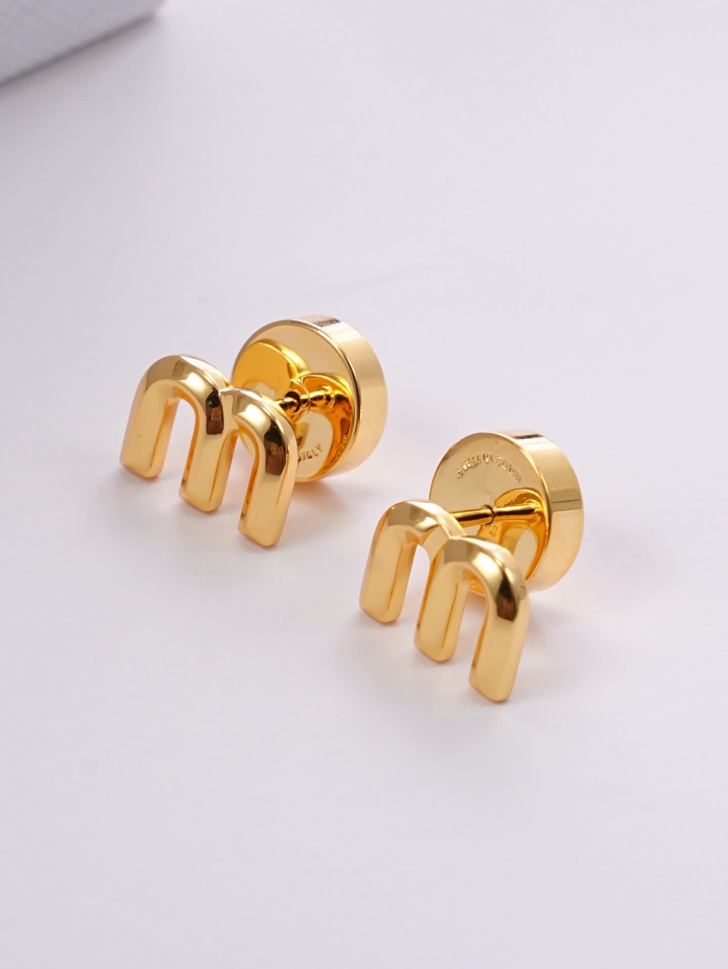 Miu Miu Gold Tone 'M' Stud Earrings